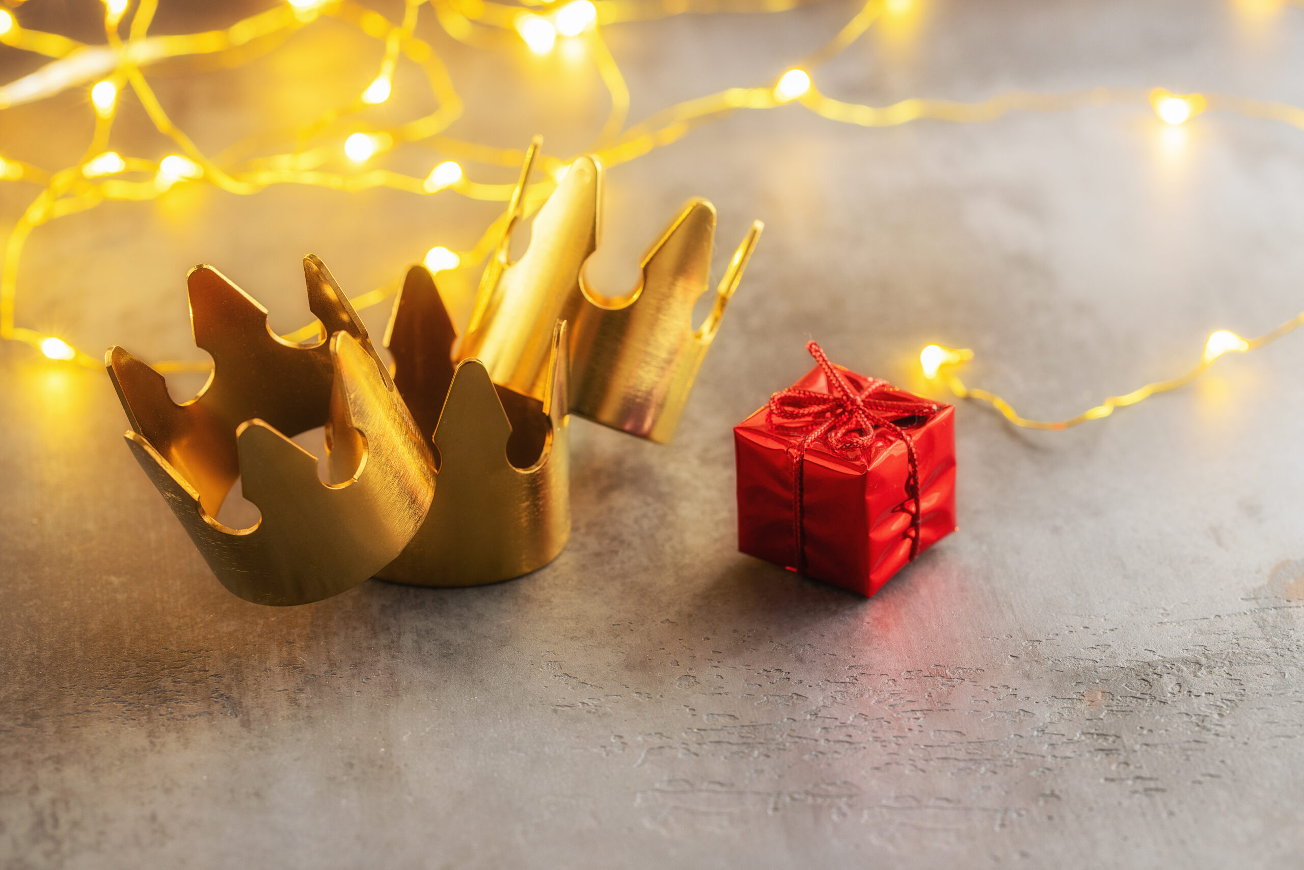 Three,Gold,Crowns,And,Red,Gift,Box,For,Concept,Of